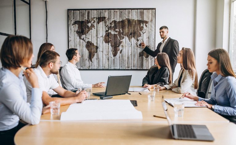 7group-people-working-out-business-plan-office